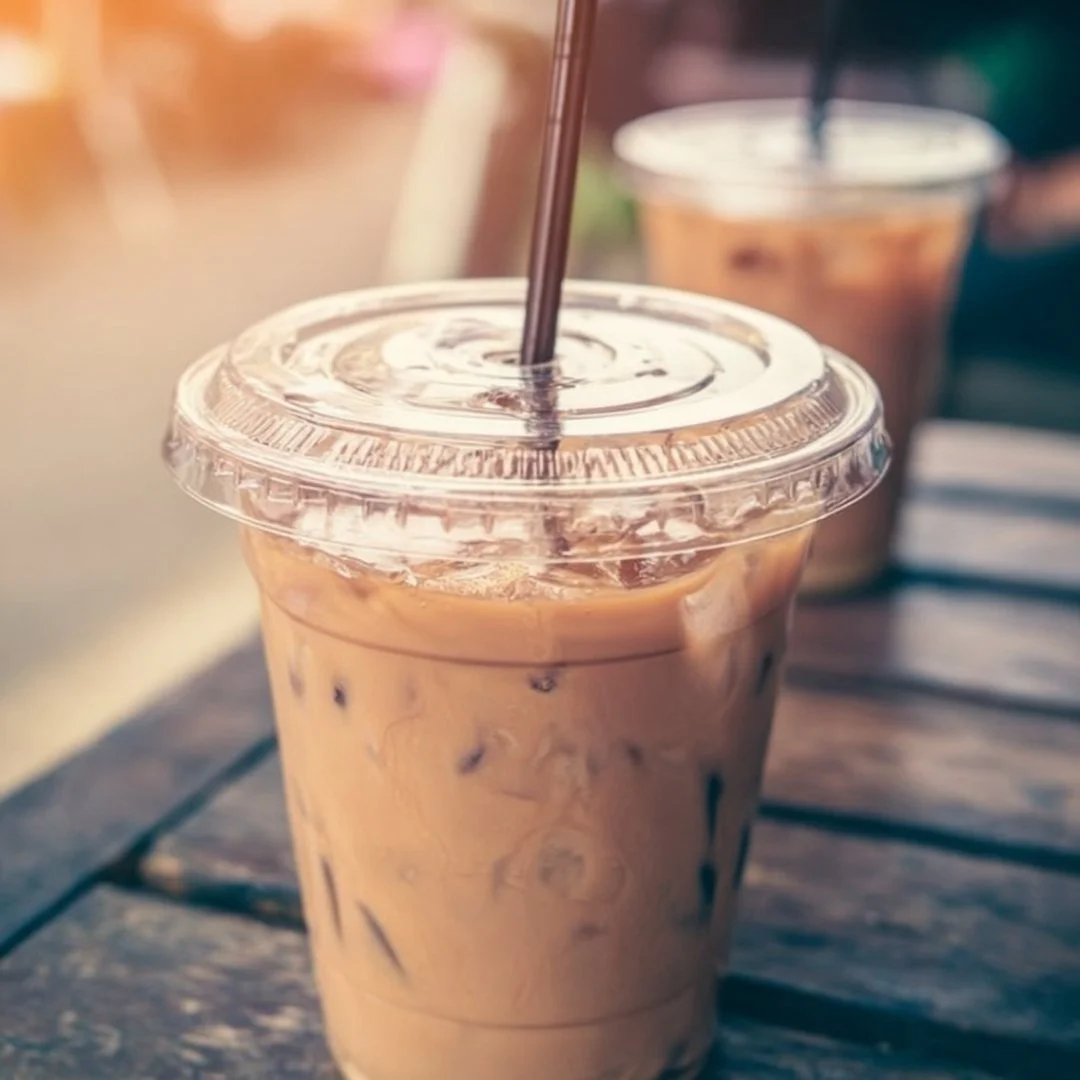 A refreshing glass of easy iced coffee with ice cubes and a straw