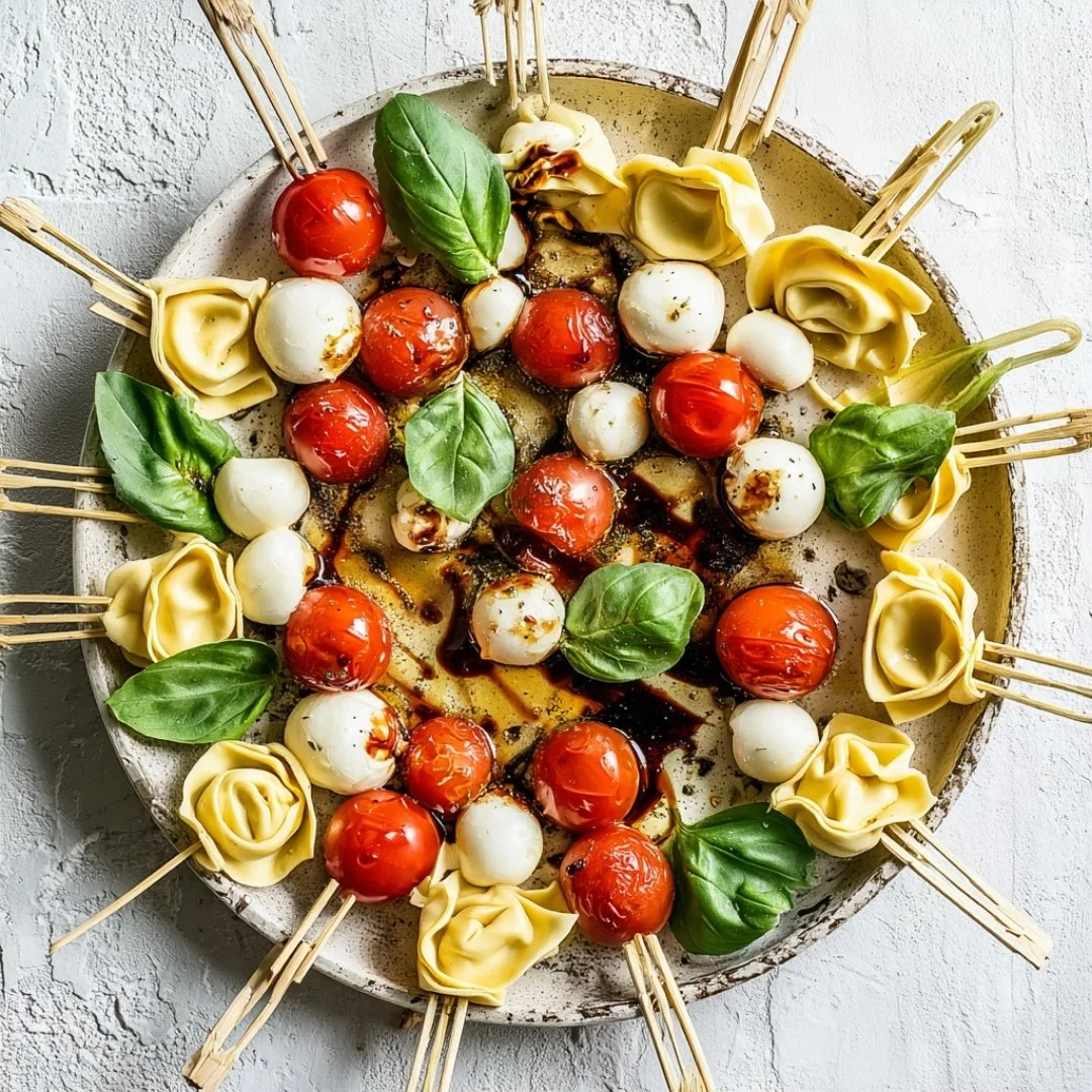 Delicious Caprese Skewers featuring fresh tomatoes, mozzarella, basil, and tortellini